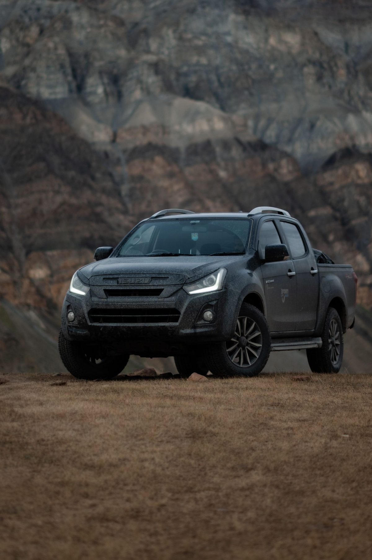 Pickup truck on rugged terrain, available for hire