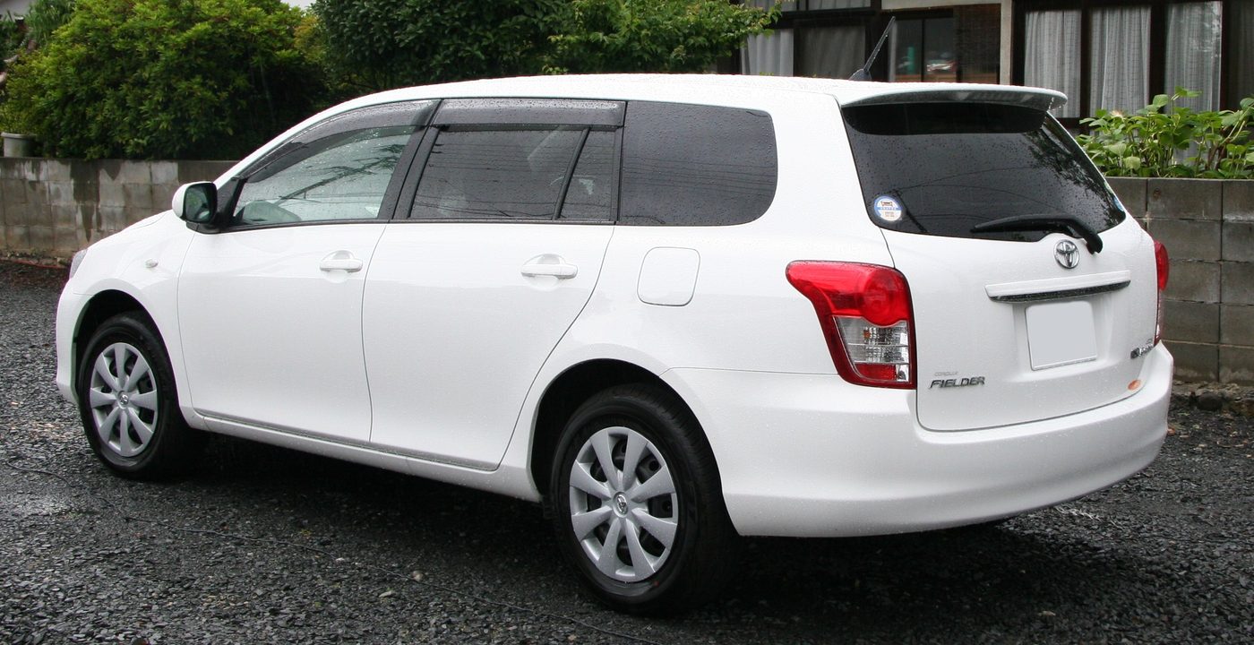 White Toyota saloon car available for hire
