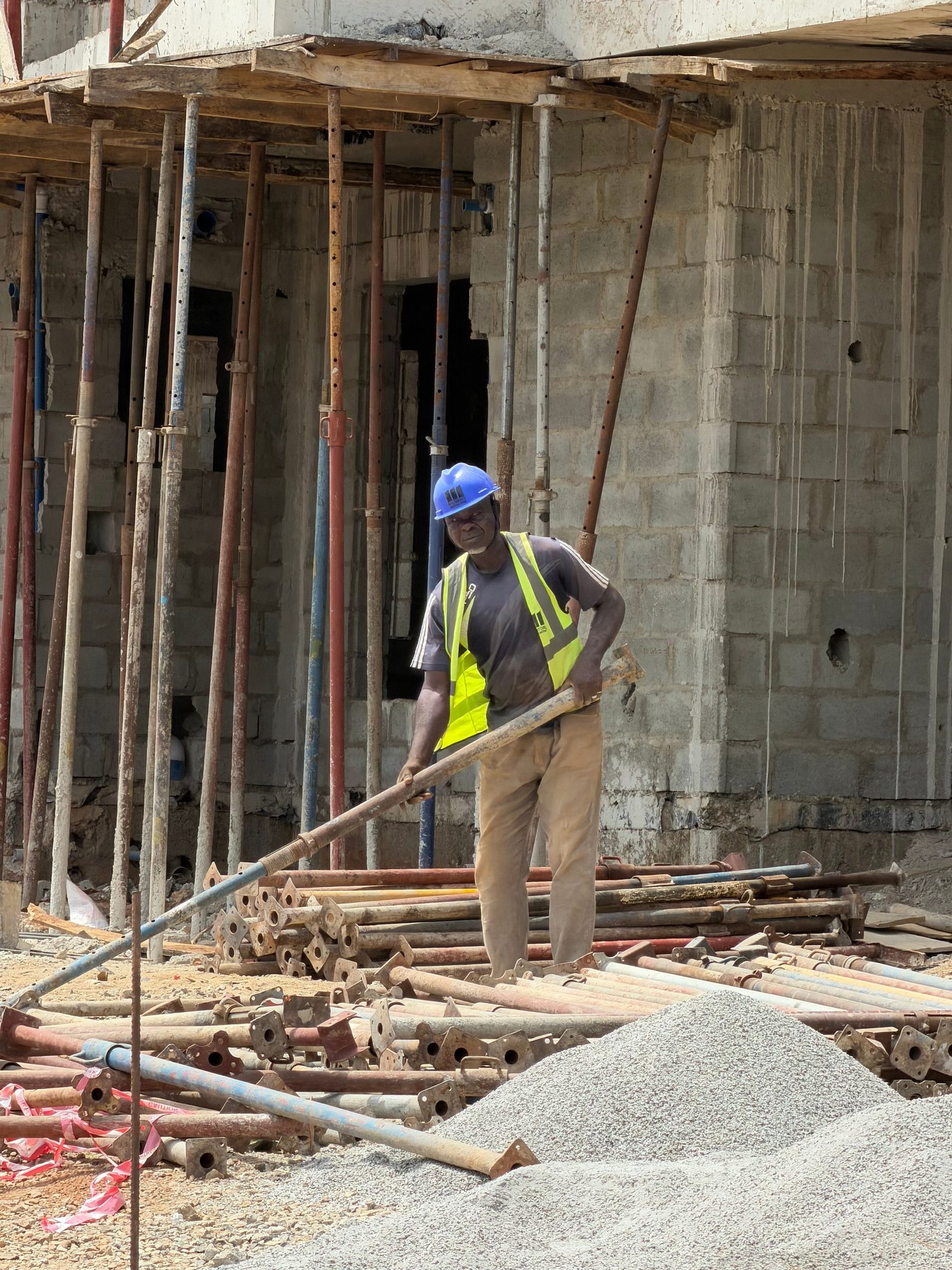 Construction worker preparing materials on a Hemmings Limited site